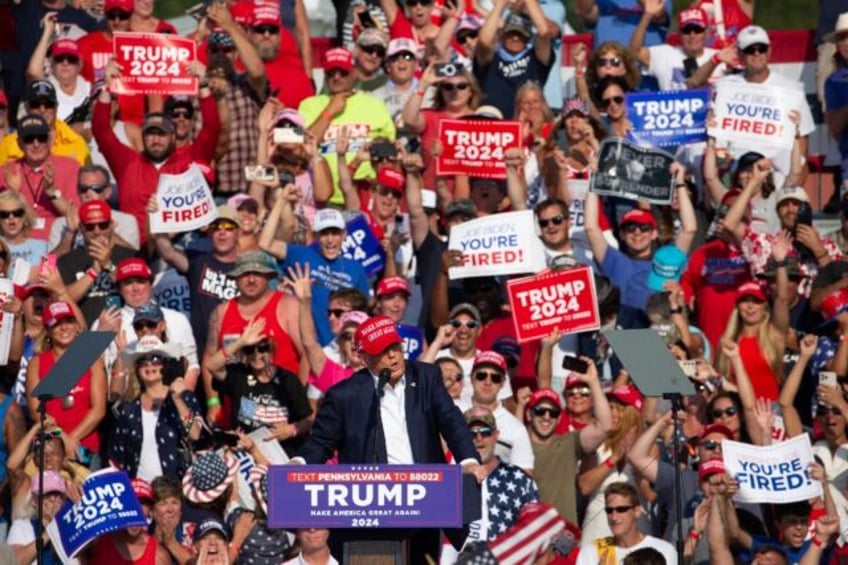 Former US President Donald Trump speaking moments before shots were fired at a rally in Pe