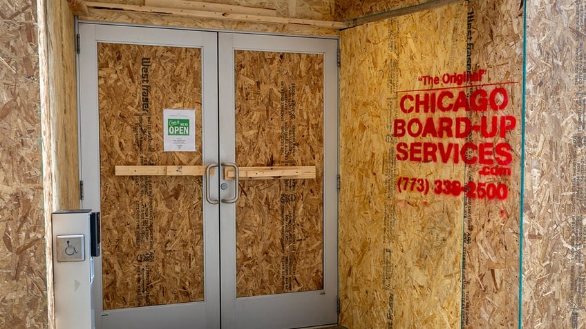 A downtown business stands boarded with the possibility of violent protests during the Democratic National Convention on Aug. 18, 2024 in Chicago, Ill.