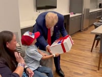 SEE IT: Trump meets young supporter with rare brain disease backstage at rally