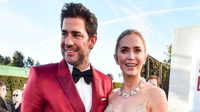 John Krasinski on the red carpet with Emily Blunt