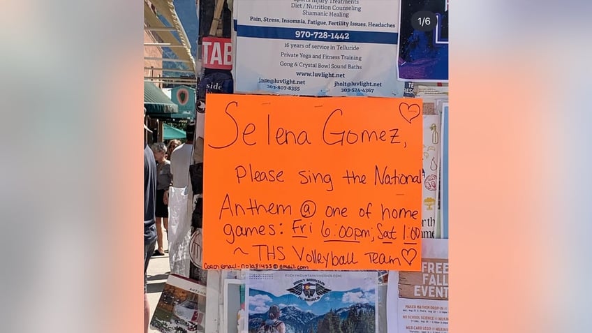 A sign requesting Selena Gomez visit a Telluride, Colorado high school's volleyball game to sing the national anthem.