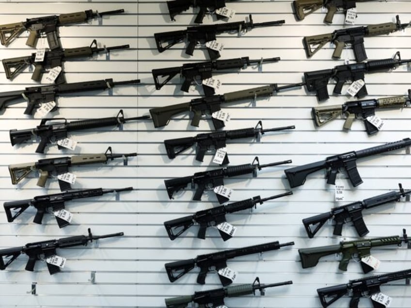 An assortment of semiautomatic rifles are on display for sale at R Guns on April 29, 2023,