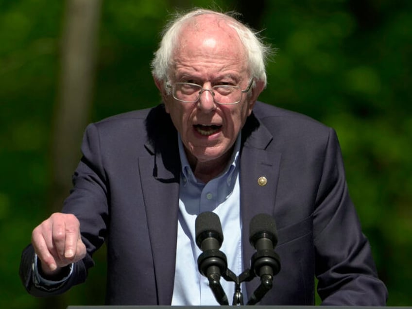 Sen. Bernie Sanders, I-Vt., speaks before President Joe Biden at …