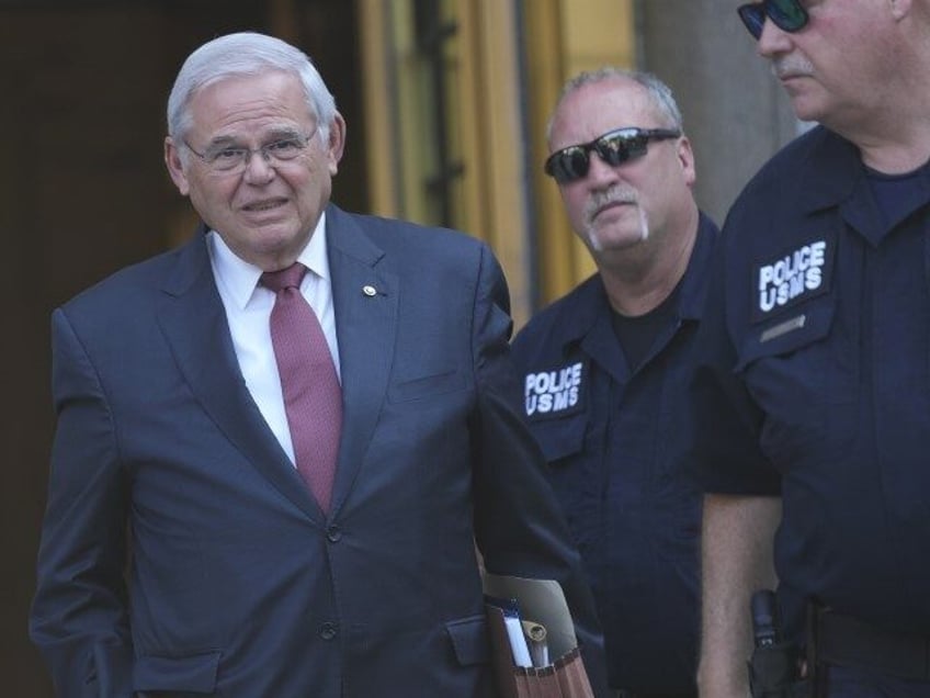 Sen. Bob Menendez, D-N.J., left, leaves federal court in New York, Monday, July 15, 2024.