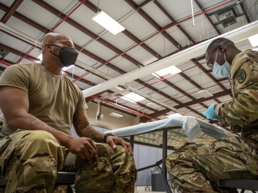 Preventative Medicine Services NCOIC Sergeant First Class Demetrius Roberson prepares to a