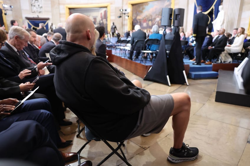 sen john fetterman arrives at inauguration in hoodie and shorts