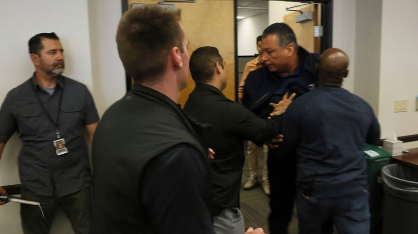 Sen. Alex Padilla escorted
