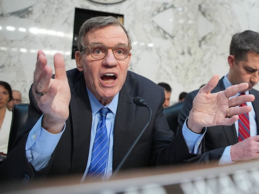 Sen. Mark Warner (D-VA) addresses National Security Agency Director General Timothy Haugh,