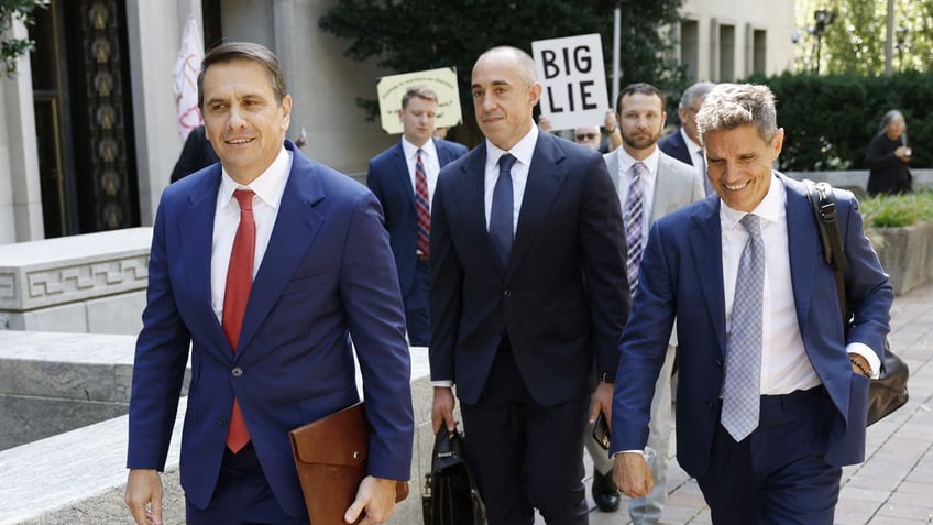 WASHINGTON, DC - SEPTEMBER 05: (L-R) Former President Donald Trump’s attorneys (L-R) Todd Blanche, Emil Bove and John Lauro depart federal court after a hearing on Trump’s election interference case on September 5, 2024 in Washington, DC. This is the first hearing since the Supreme Court ruling on presidential immunity, ruling 6-3 that presidents have some level of immunity from prosecution when operating within their 