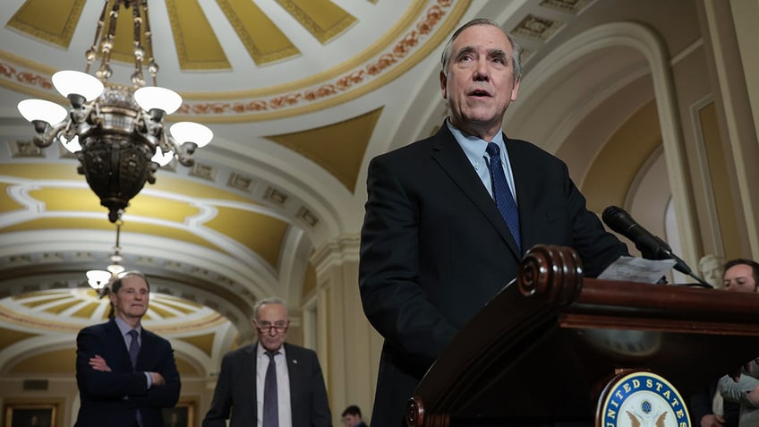 Merkley, Schumer and Wyden at a press conference on Capitol Hill
