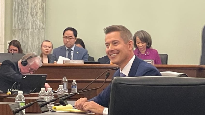 Sean Duffy in hearing room, smiling 