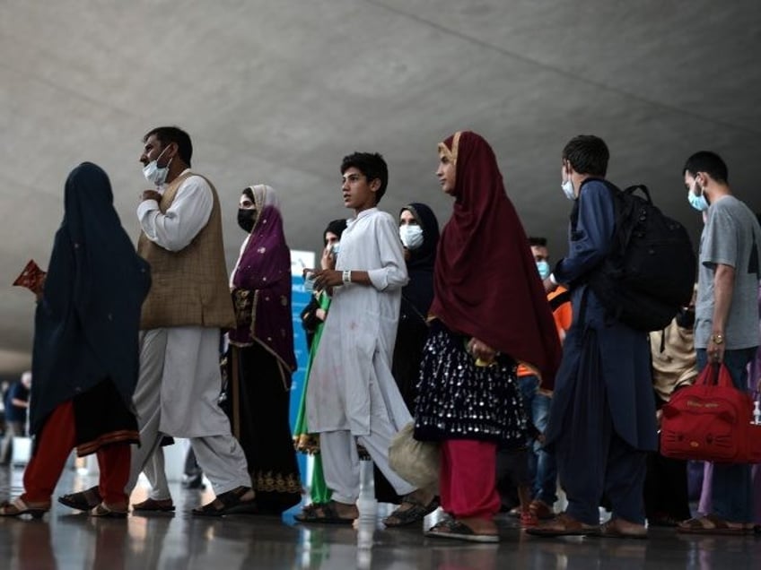 senators look to slip green card giveaway for bidens afghans into defense spending bill