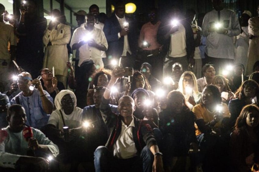 Members of the Senegalese media at a vigil to protest against police violence