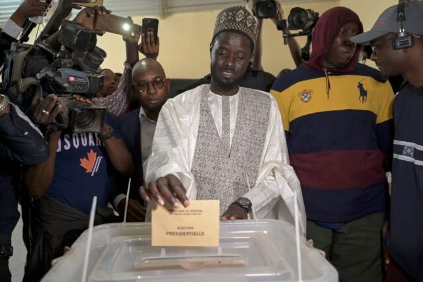 Bassirou Diomaye Faye, 44, votes in his home village of Ndiandiaye in Senegal's presidenti