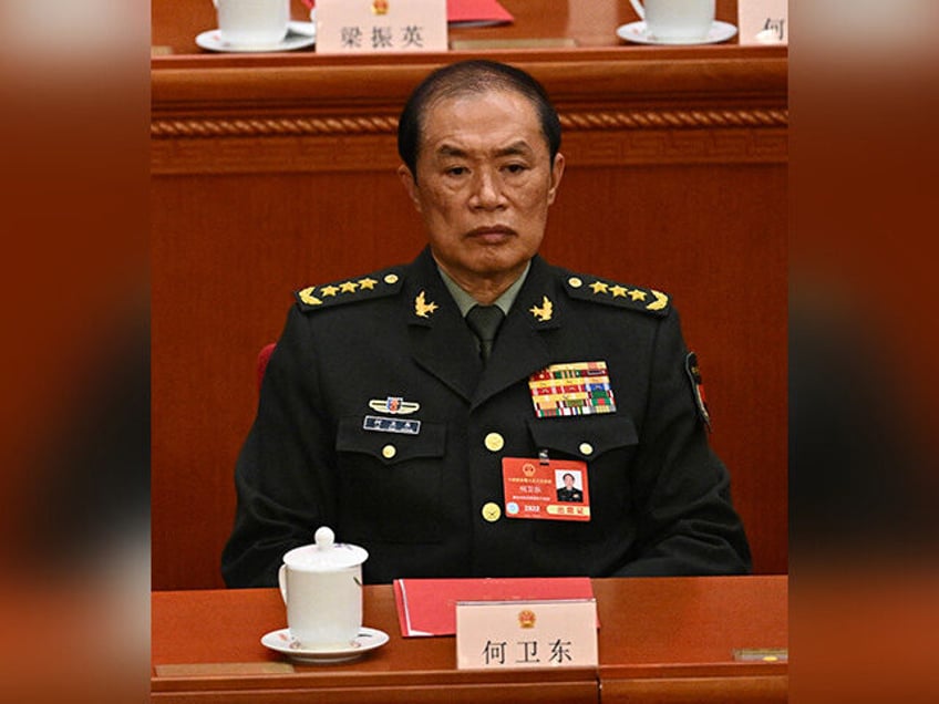He Weidong (R), second-ranked vice chairman of China's Central Military Commission (CMC),