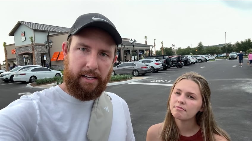 Alex and Tember Fowler outside of a Hooters in The Villages, Florida.
