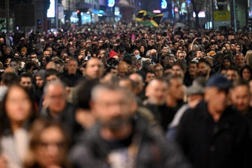 Serbian opposition supporters protest what they say was electoral fraud in Serbia's recent parliamentary and local elections