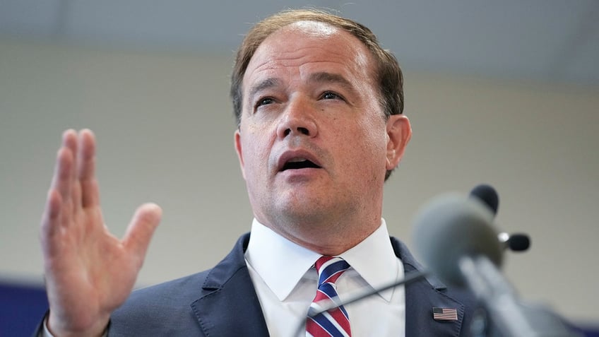 Suffolk County District Attorney Ray Tierney speaks to reporters during a news conference