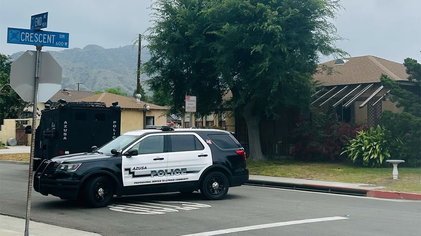 Neighborhood in California with police SUV 