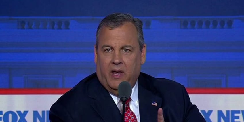 seven of eight republican candidates raise hands to say theyd support trump as nominee even if convicted