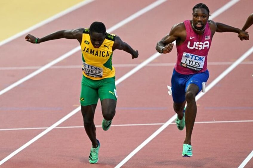 Jamaica's Oblique Seville, left, beat reigning world champion Noah Lyles of the United Sta