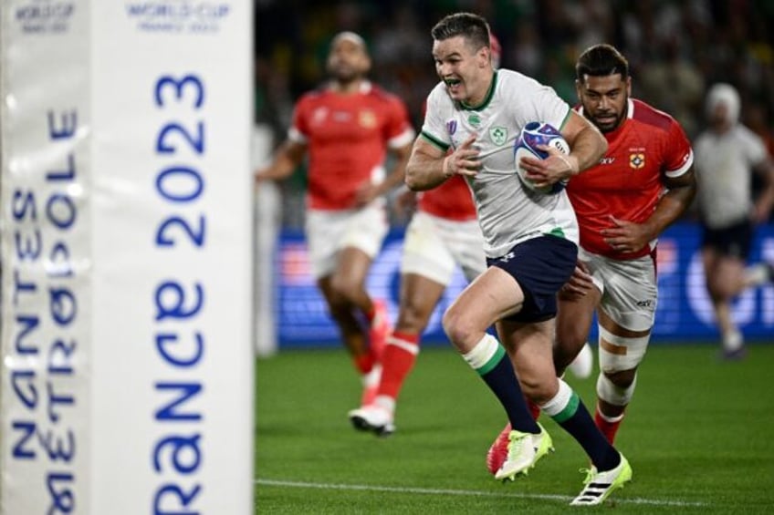 sexton steals the show with new landmark as irish thrash tonga