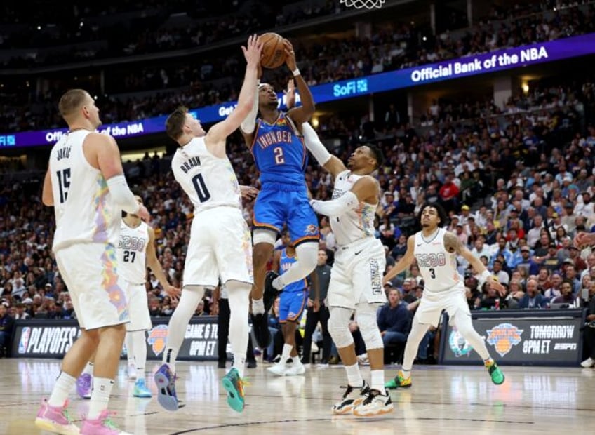 Shai Gilgeous-Alexander of the Oklahoma City Thunder (blue) won the NBA's MVP award on Wed