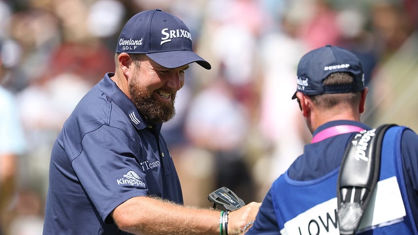 Shane Lowry with caddie