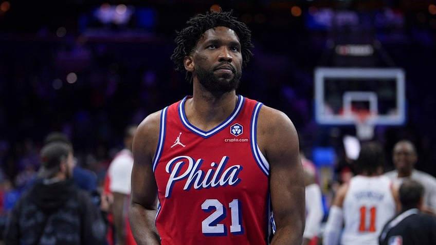 Joel Embiid walks off the court