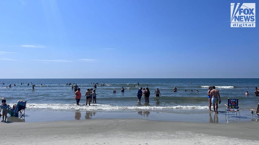 Beachgoers in bathing suits at Hilton Head beach