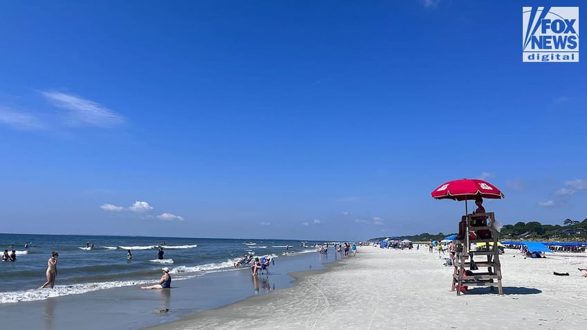 Beachgoers in bathing suits at Hilton Head beach