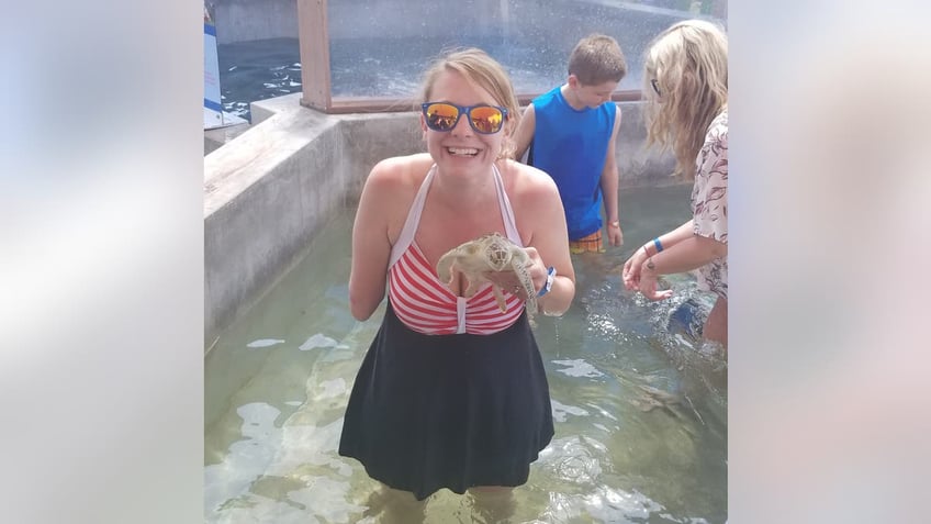 Tiffany Johnson during her Grand Cayman cruise after the shark attack.