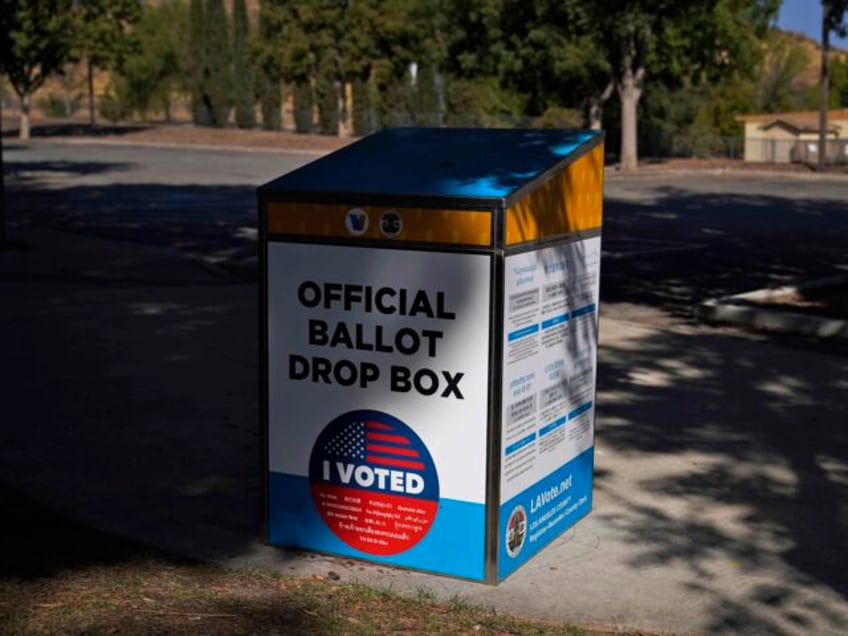 An official ballot drop box is seen Wednesday, Oct. 14, 2020, in Santa Clarita, Calif. Wit