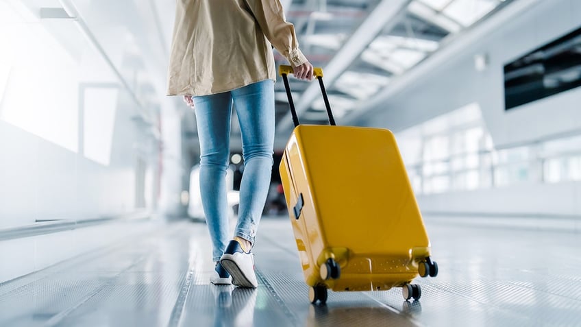 Person pulling luggage