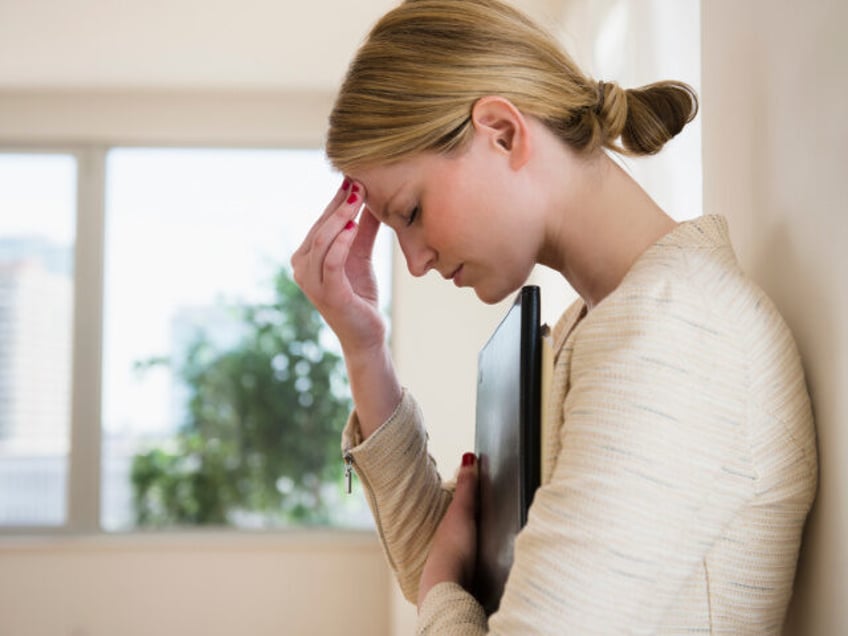 Stressed Businesswoman, Getty Images iStock