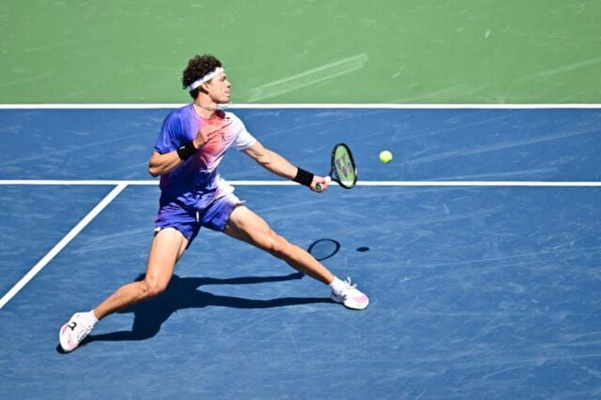 Ben Shelton of the United States makes a return during his victory over Alexander Bublik o