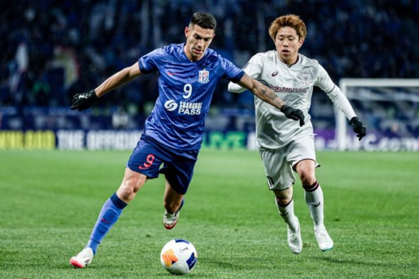 China's Shanghai Shenhua beat Japan's Vissel Kobe in the Asian Champions League on Tuesday