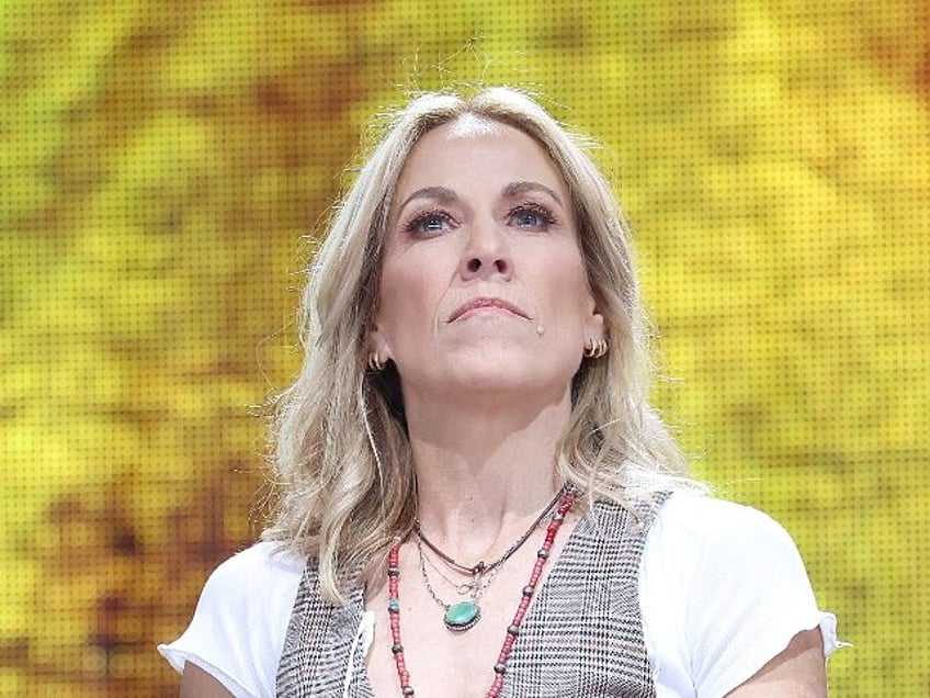 RALEIGH, NORTH CAROLINA - SEPTEMBER 24: Sheryl Crow performs in concert during Farm Aid at