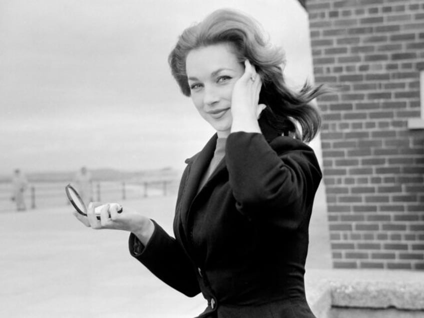 Shirley Anne Field on location at Morecambe where she takes the part of a bathing beauty in the new film 'The Entertainer'. She wears a diamond ring on the third finger of her left hand but she says she is not engaged, 23rd September 1959. (Photo by Arthur Bottomley/Mirrorpix/Getty Images)