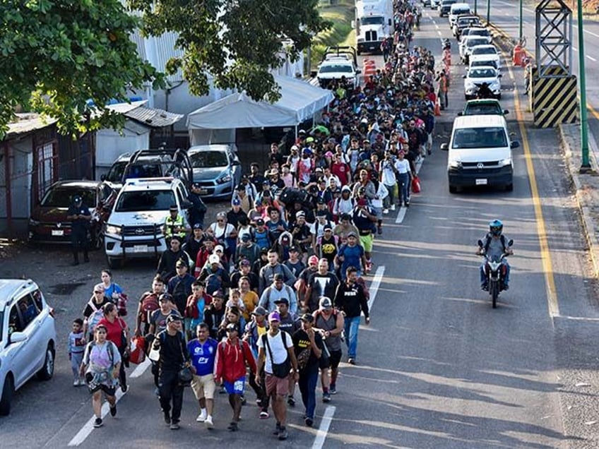 Migrants walk through Tapachula, Chiapas state, Mexico, in an attempt to reach the U.S. bo