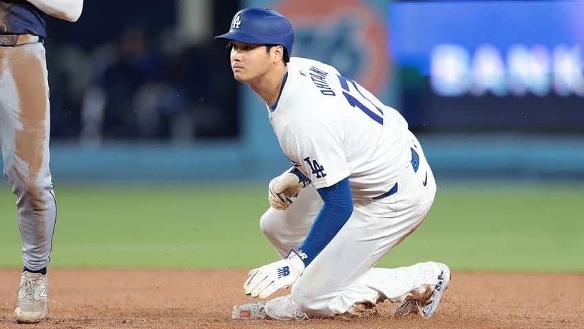 Shohei Ohtani slides into second base