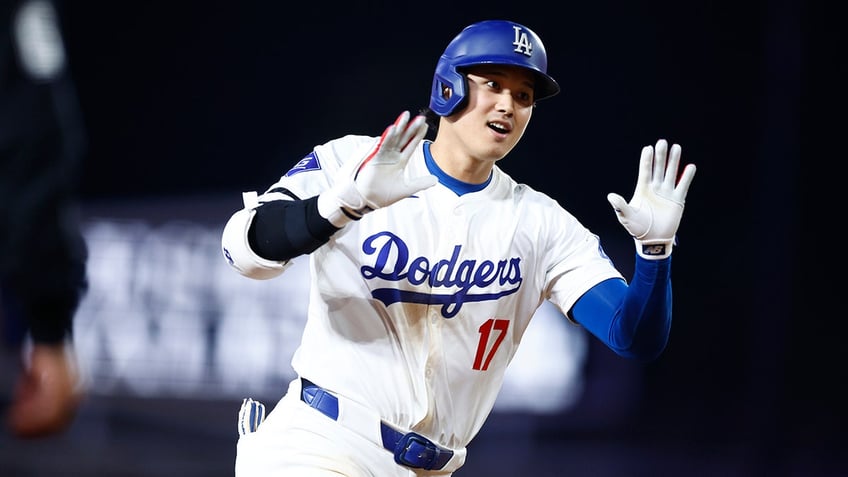 Shohei Ohtani reacts to home run