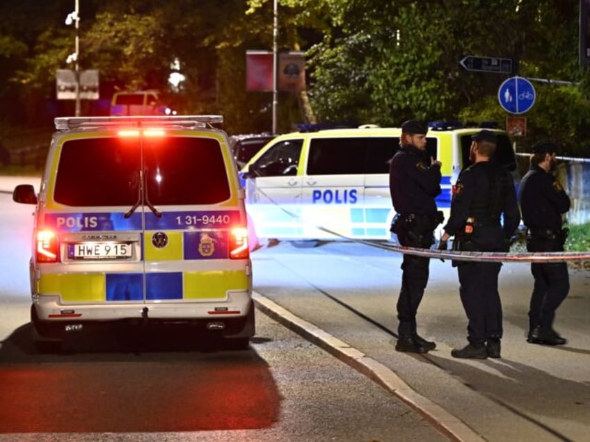 Police secures the area near the Israeli embassy in Stockholm after a suspected shooting o