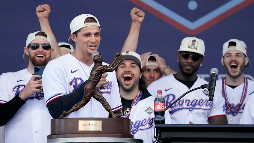 shots fired two arrested after firing gun near texas rangers world series parade police