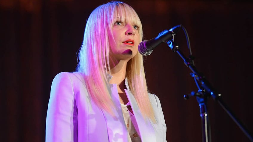 sia reveals she was severely depressed and in bed for three years after divorce a dark time