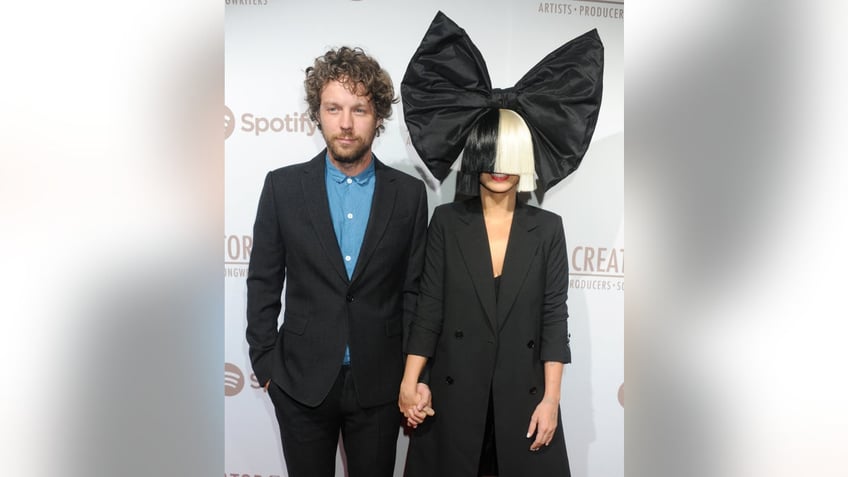 sia reveals she was severely depressed and in bed for three years after divorce a dark time