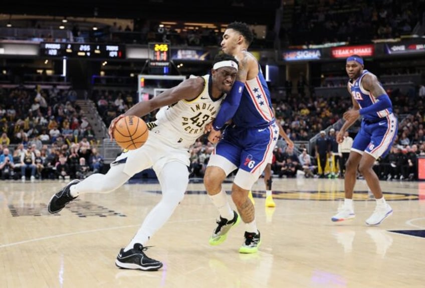 Indiana's Pascal Siakam drives past KJ Martin in the Pacers' NBA victory over the Philadelphia 76ers