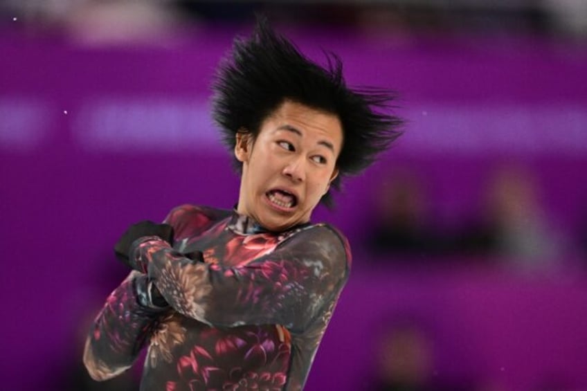 Hair-raising: France's Adam Siao Him Fa performs during the free program on Friday