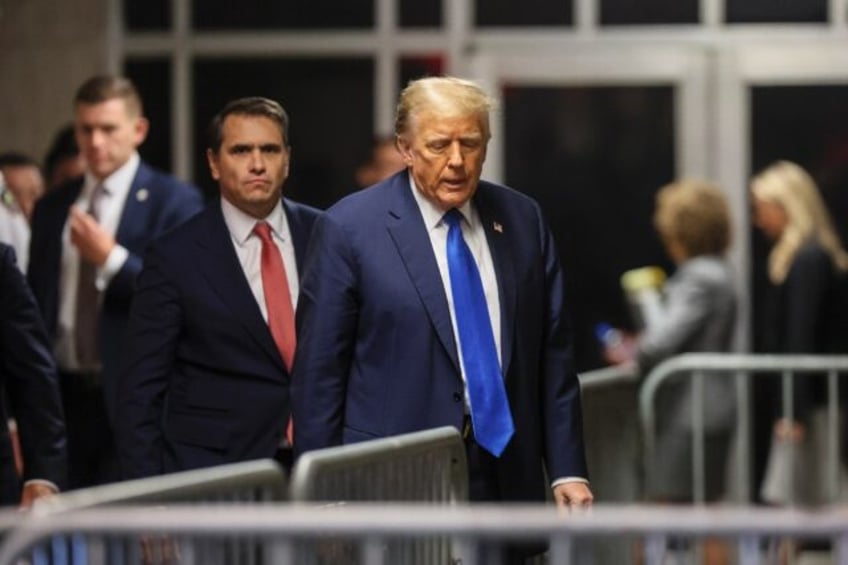 Donald Trump departs after proceedings at his trial in Manhattan Criminal Court on April 2