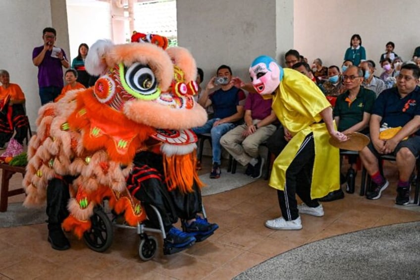 The Silver Pride Lion Troupe has coaxed more than a dozen elderly people out of retirement